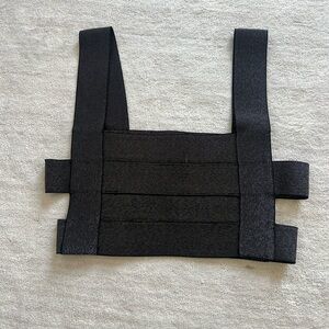 The naked tiger cut out crop top